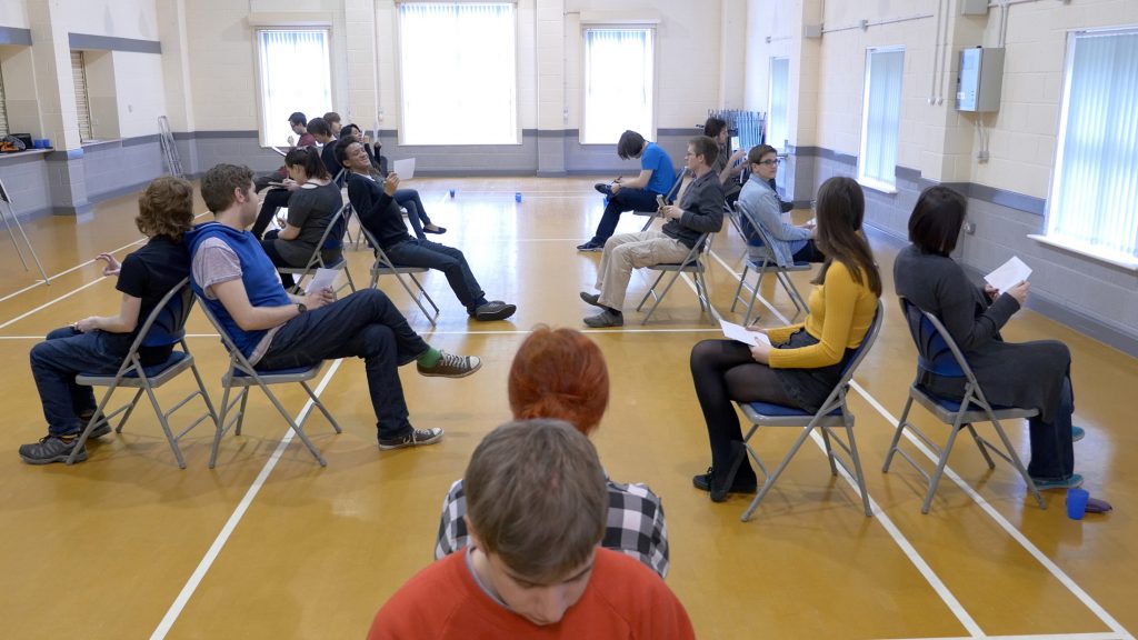 picture of students playing a listening game
